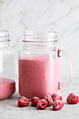 Gluten-free raspberry and coconut drink with hemp seeds