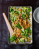 Chickpea and cauliflower salad with dukkah, avocado and baby spinach in a tray