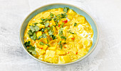 Yellow potato curry with yoghurt