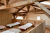 Sleeping area on gallery in converted, renovated barn