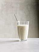 White power smoothie made from egg, almond mousse, chia and banana