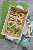 Baked potatoes with wild garlic and sheep's cheese