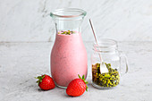 Strawberry shake with pistachio nuts