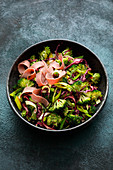Oriental broccoli and leek salad with roast beef