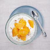 Crunchy cup with quark and oranges