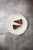 Two slices of chocolate tart on a plate