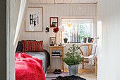 Small, cosy, sunny bedroom in Scandinavian style