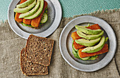 Wholemeal open fish finger sandwich with avocado