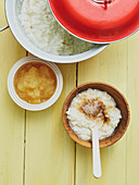Rice pudding with cinnamon sugar and apple sauce