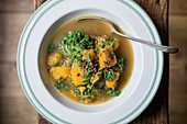 Bowl of Sauasage, Butternut and Kale Soup