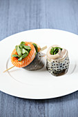 Trout rollmops with spinach leaves