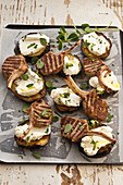 Lamb cutlets on eggplant with hommus and creamy goats cheese