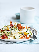 Stracci con zucchine, culatello e fiori (fresh pasta with zucchini, bacon and flowers, Italy)