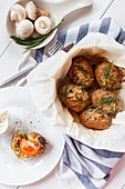 Baked potatoes with cheese, mushrooms and tomatoes