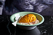 Rice pudding with mango sorbet
