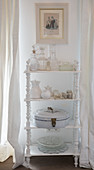 Vintage ornaments on white shelves