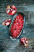 Pomegranate seeds and a broken pomegranate