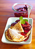Pancakes with damson compote