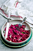 Ravioli dough with beets stuffed with ricotta and sage