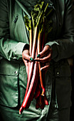 Women holding rhubarb