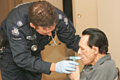 Paramedic Treating COPD Patient