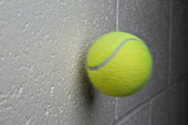 Tennis Ball About to Collide with a Wall
