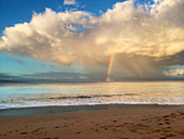 A rainbow over Charley Young Beach, Maui, Hawaii, USA