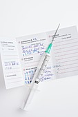 Travel vaccination certificate with syringe