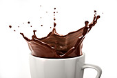 Cup with dark chocolate splash, illustration