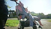 Toddler in buggy outdoors