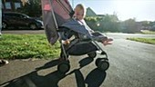 Toddler in buggy outdoors