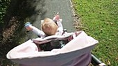 Person pushing child in buggy