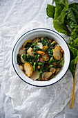 Fried potatoes with red onions, chard and chickpeas (vegan)