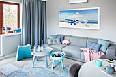 Modern living room in blue, grey and pink
