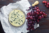 Blue cheese with red grapes