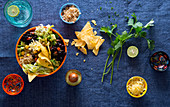 Mexican bowl with beans, lettuce and nachos
