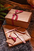 Wrapped Christmas gifts on sheepskin rug