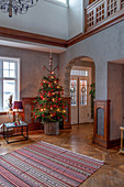 Christmas tree in foyer of Scandinavian villa