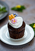 Chocolate cupcake with flowers decoration