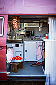 A kitchen in a camping bus
