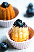 Canelés with blueberries