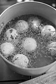 Crispy dough balls being fried