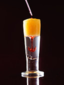 Holdrio with orange juice (molecular gastronomy)