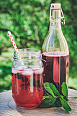 Detox lemonade with blackberries, syrup and rosemary