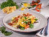 Tagliatelle with grilled vegetables, parmesan and cherry tomato sauce