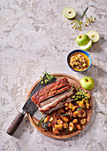 Whisky, sage and maple pork belly with buttery caramelised apples