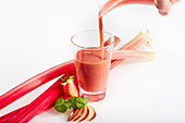 Rhubarb and strawberry smoothie with basil and apple slices