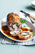 Rabbit roulade with a fennel and bacon filling
