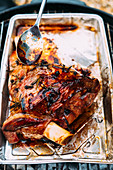 Leg of lamb cooked on a BBQ