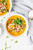 Peanut and sweet potato soup with topping